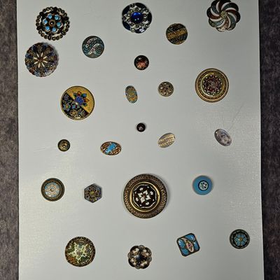 Sale Photo Thumbnail #198: A Collection of 25 Assorted Antique and Vintage Enamel Buttons