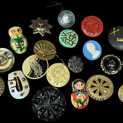 A Collection of Vintage and Antique Decorative Buttons and an Iridescent Shell Belt Buckle