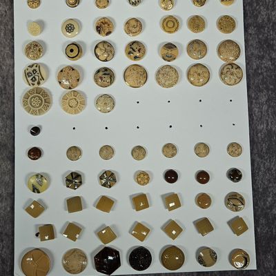 An Assortment of Vintage Art Deco and Mid-Century Buttons Including Celluloid Bakelite and Vegetable Ivory