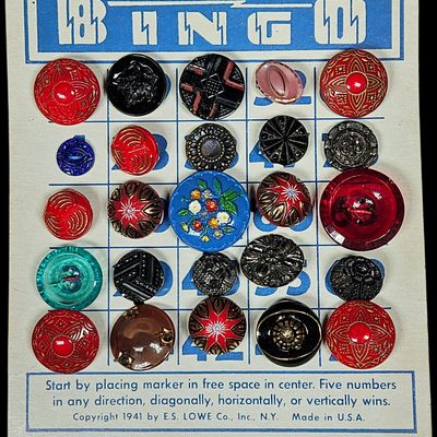 Sale Photo Thumbnail #131: A Collection of Twenty-Five Vintage Buttons Displayed on a 1941 Bingo Card
