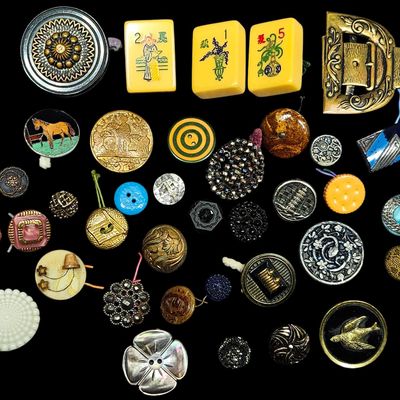 A Collection of Vintage and Antique Buttons, Mahjong Tiles, and a Brass Buckle