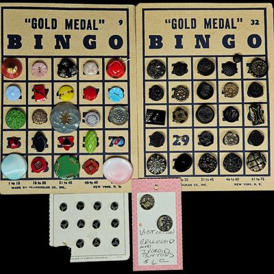 Sale Photo Thumbnail #144: A Collection of Antique and Vintage Buttons Mounted on Transogram Gold Medal Bingo and Retail Cards