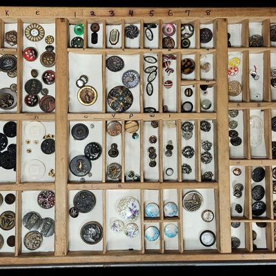 Sale Photo Thumbnail #359: An Assortment of Antique and Vintage Buttons and Garment Fasteners in a Wooden Typesetter Tray
