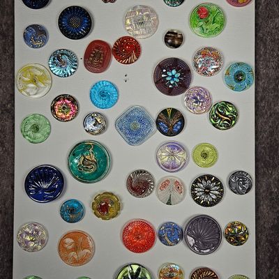 Sale Photo Thumbnail #245: An Assortment of Bohemian and Czech Style Molded Glass Buttons Including Uranium Glass