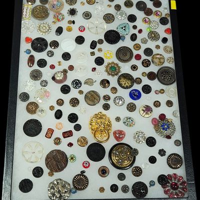 Sale Photo Thumbnail #154: A Collection of Approximately 180 Vintage and Antique Buttons Including Glass Enamel and Stamped Metal