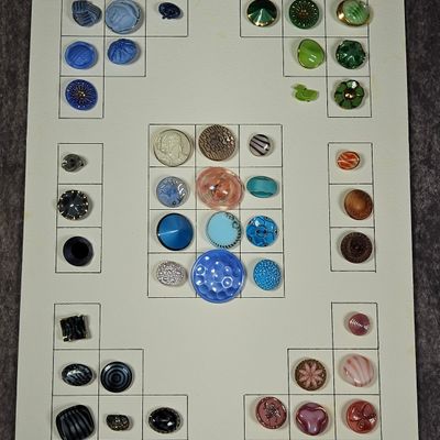 An Assortment of Vintage and Antique Glass and Composition Buttons on Card