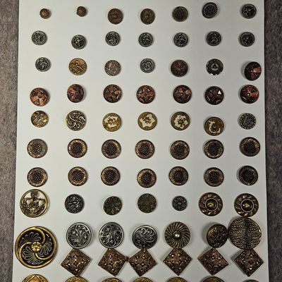 Sale Photo Thumbnail #252: A Group of Vintage and Antique Assorted Metal Sewing Buttons Including Military and Figural Motifs