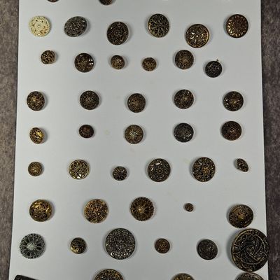 Sale Photo Thumbnail #259: A Collection of Victorian and Early 20th Century Ornamental Metal and Glass Buttons