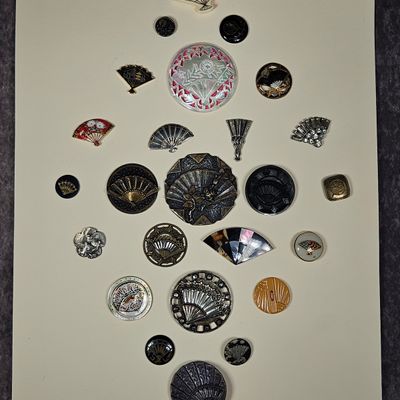 A Collection of Antique and Vintage Buttons and Accessories Featuring Fan Motifs