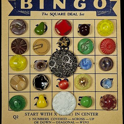 Sale Photo Thumbnail #315: Assortment of Decorative Vintage Buttons on 1936 Selchow and Righter Bingo Sample Card