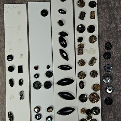 Sale Photo Thumbnail #318: An Assortment of Antique and Vintage Black Glass and Ornamental Buttons