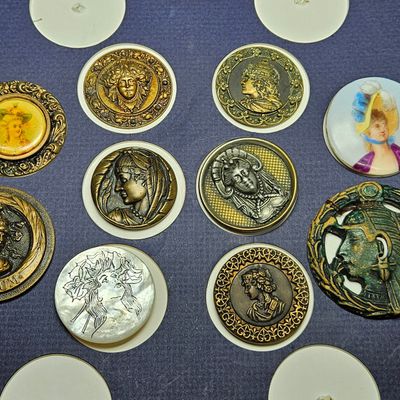 A Collection of Antique and Vintage Portrait Costume Buttons Including Art Nouveau and Egyptian Revival Motifs
