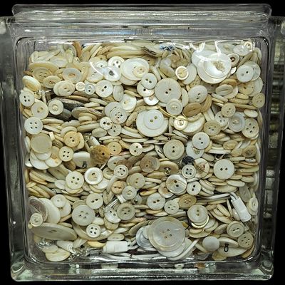 Sale Photo Thumbnail #335: Decorative Lighted Glass Block Filled with Large Assortment of White and Cream Buttons