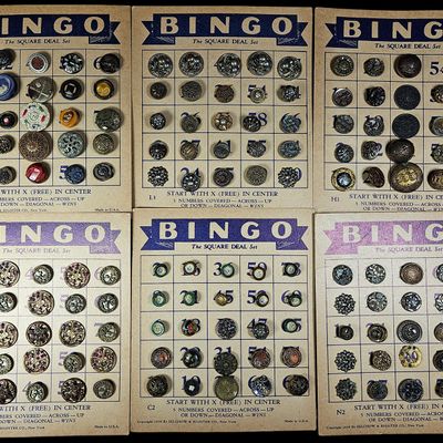 Sale Photo Thumbnail #306: An Assortment of Antique and Vintage Buttons Mounted on 1936 Selchow and Righter Bingo Cards
