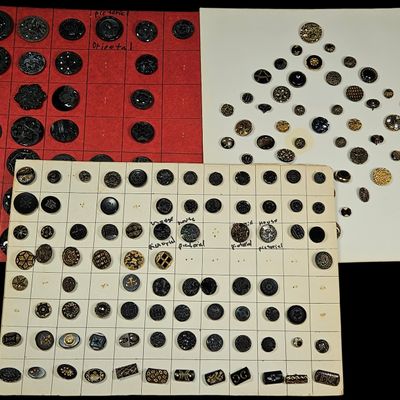 A Collection of Antique Black Glass and Luster Sewing Buttons on Sample Cards