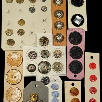 Sale Photo Thumbnail #192: A Collection of Antique and Vintage Buttons Including Victorian Black Glass, Militaria, and Artisan Examples