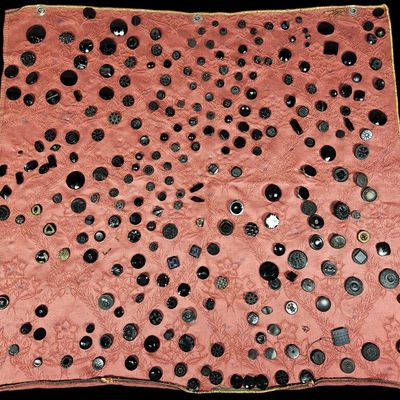 Sale Photo Thumbnail #350: A Collection of Approximately 250 Vintage and Antique Black Buttons Mounted on a Damask Fabric Display