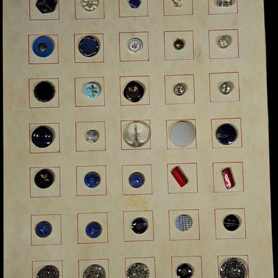 Sale Photo Thumbnail #146: A Collection of Vintage Molded and Painted Glass Buttons on Display Card