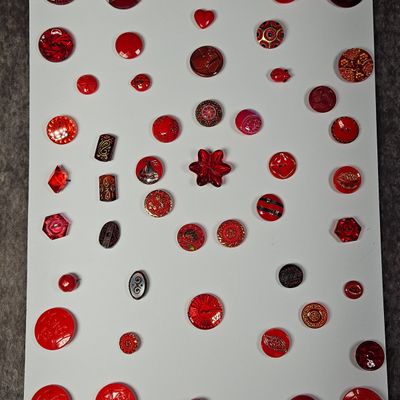 Sale Photo Thumbnail #226: A Collection of Vintage and Antique Red Glass and Early Plastic Buttons