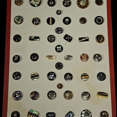 Sale Photo Thumbnail #121: A Collection of Antique and Vintage Black Glass and Shell Inlaid Buttons
