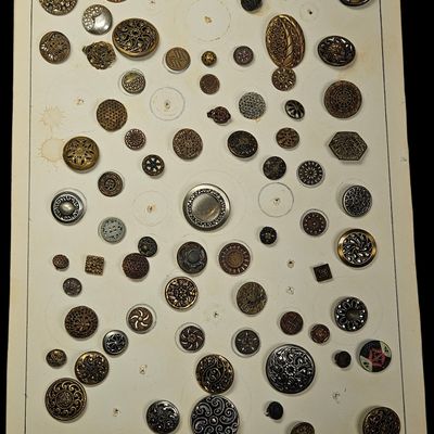 A Collection of Victorian and Edwardian Era Metal and Glass Buttons on Display Card