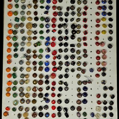Sale Photo Thumbnail #169: A Collection of Approximately 275 Vintage Pressed Glass Buttons on Display Card