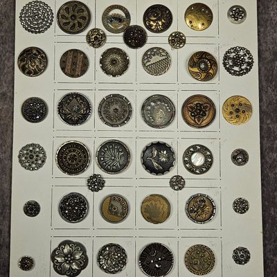 Sale Photo Thumbnail #238: A Collection of Victorian and Edwardian Steel Cut and Mixed Metal Decorative Buttons