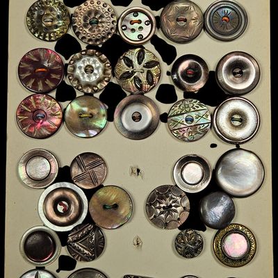 Sale Photo Thumbnail #316: A Collection of 36 Antique and Vintage Carved Mother of Pearl and Abalone Shell Buttons