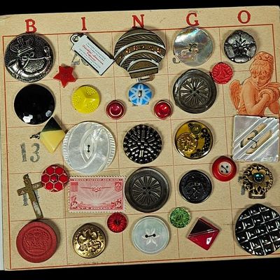 Sale Photo Thumbnail #145: A Collection of Vintage and Antique Buttons and Ephemera Including Glass, Inlay, and Military Examples