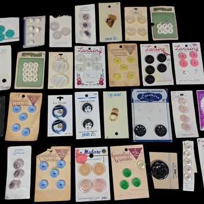 Sale Photo Thumbnail #385: A Collection of Vintage Sewing Buttons on Original Retail Backing Cards Featuring Lansing, La Mode, and Le Chic