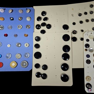 Sale Photo Thumbnail #293: A Collection of Approximately 60 Vintage and Antique Glass, Plastic, and Metal Buttons on Display Cards