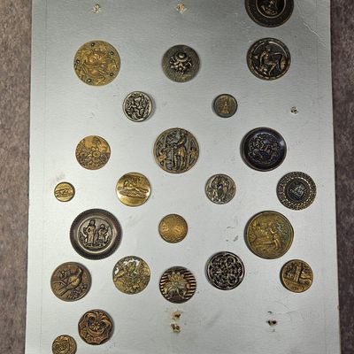 Sale Photo Thumbnail #254: A Collection of Twenty-Six Antique and Vintage Pictorial Metal Buttons