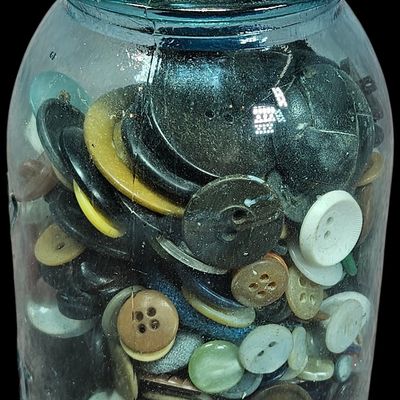 Sale Photo Thumbnail #344: An Assortment of Vintage Sewing Buttons in a Blue Glass Mason Jar