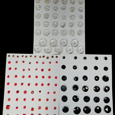 Sale Photo Thumbnail #308: A Collection of Approximately 188 Vintage Clear, Black, and Red Glass Buttons