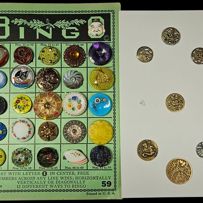 Sale Photo Thumbnail #272: A Collection of Vintage and Antique Buttons Featuring Glass Metal and Figural Porcelain Examples