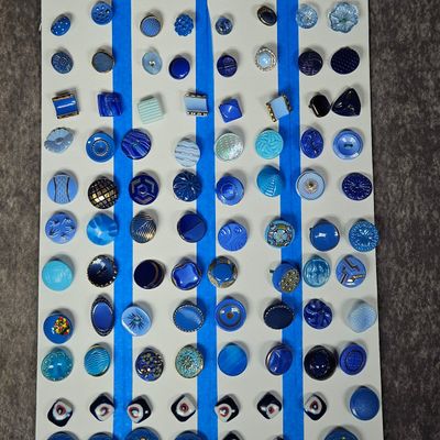 A Collection of Vintage Blue and Black Glass and Plastic Sewing Buttons
