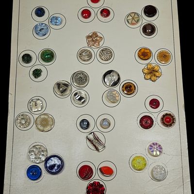 Sale Photo Thumbnail #182: A Collection of 42 Vintage Costume Buttons on Card Mount