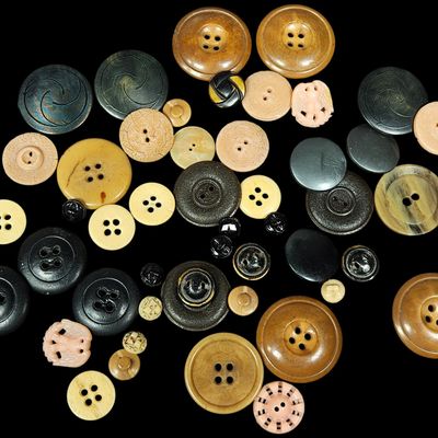Sale Photo Thumbnail #383: A Collection of Approximately 48 Vintage and Antique Sewing Buttons in Vegetable Ivory, Plastic, and Shell