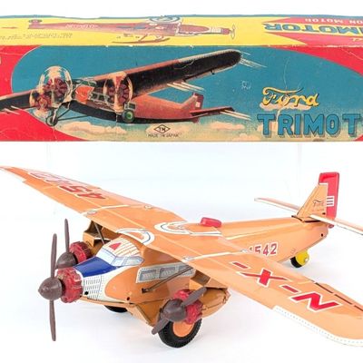 T.N. Japan Tin Friction Ford Trimotor Airplane w/ Box