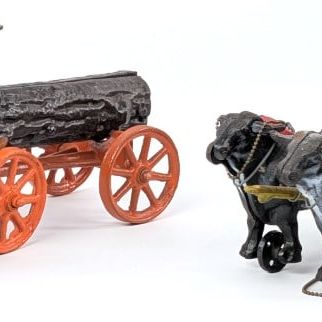 (2) Reproduction Hubley Cast Iron Ox Drawn Log Wagon