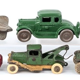 Cast Iron Tow Trucks, Zeppelin, and Cars