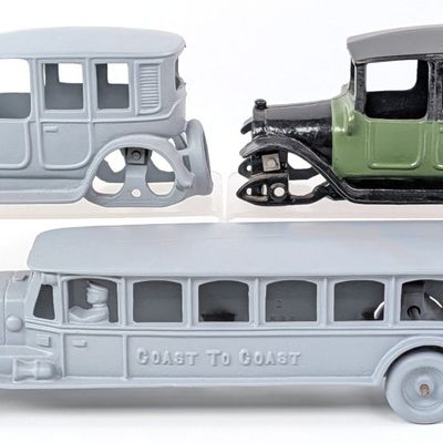Arcade Cast Iron Sedan and Hubley Coast To Coast Bus