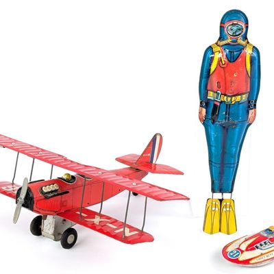 Japan Tin Scuba Diver, Curtiss Jenny, and Swift Boat