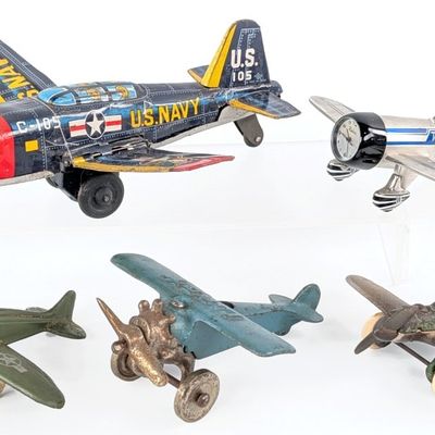 Cast Iron, Rubber, Tin, and Die-Cast Airplane Toys