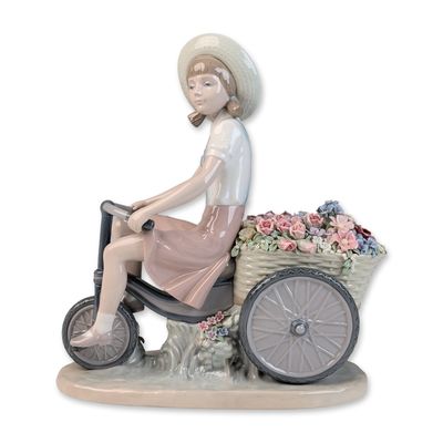 Sale Photo Thumbnail #425: Lladro Porcelain Figurine, Girl with Flowers in Tow 01005031