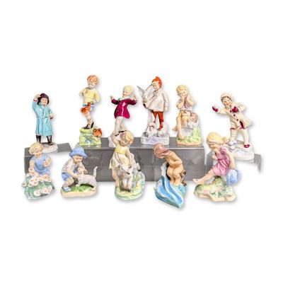Sale Photo Thumbnail #318: 11pc Royal Worcester Months of the Year Porcelain Figurine Set
