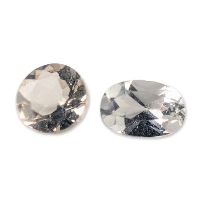 Sale Photo Thumbnail #356: Two Loose Faceted Topaz Gemstones
