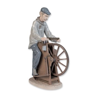 Sale Photo Thumbnail #232: Lladro Porcelain Figurine, Sharpening the Cutlery 01005204