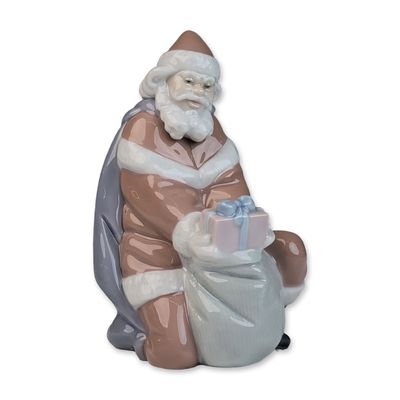 Sale Photo Thumbnail #240: Lladro Porcelain Figurine, A Gift From Santa 01006575
