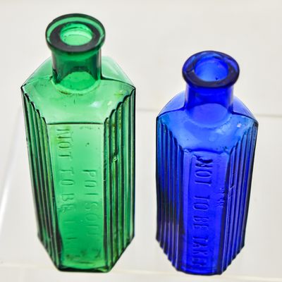VICTORIAN-ERA COBALT BLUE AND EMERALD GREEN POISON BOTTLES